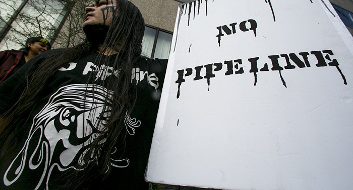 Dakota access pipeline restarts construction, tribe renews legal fight